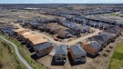 New homes are built in a housing construction development in the west-end of Ottawa on Thursday, May 6, 2021. THE CANADIAN PRESS/Sean Kilpatrick