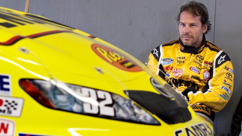 In this Aug. 29, 2009, file photo, NASCAR driver Jacques Villeneuve takes a break during the morning practice session for the NASCAR Nationwide auto race in Montreal. (THE CANADIAN PRESS / Paul Chiasson)
