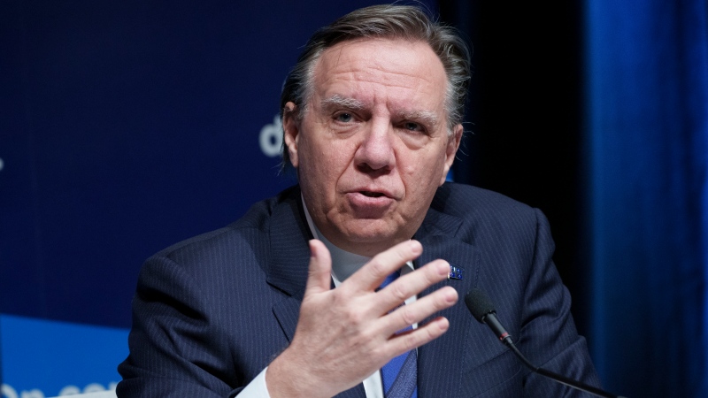 Quebec Premier Francois Legault responds to a question during a news conference in Montreal, Tuesday, Jan. 11, 2022. THE CANADIAN PRESS/Paul Chiasson 