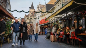 People enjoy the reopening of bars in Valkenburg, Netherlands, on Jan. 14, 2022. (Peter Dejong / AP) 