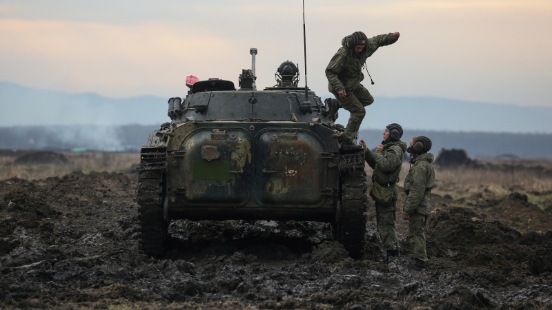 Russian servicemen take part in a military drills at Molkino training ground in the Krasnodar region, Russia, Tuesday, Dec. 14, 2021. Russia on Tuesday carried out military exercises in the Rostov region near its border with Ukraine. Tensions between the two countries rose in recent weeks amid reports of a Russian troop buildup near the border that stoked fears of a possible invasion -- allegations Moscow denied and in turn blamed Ukraine for its own military buildup in the east of the country. (AP Photo) 