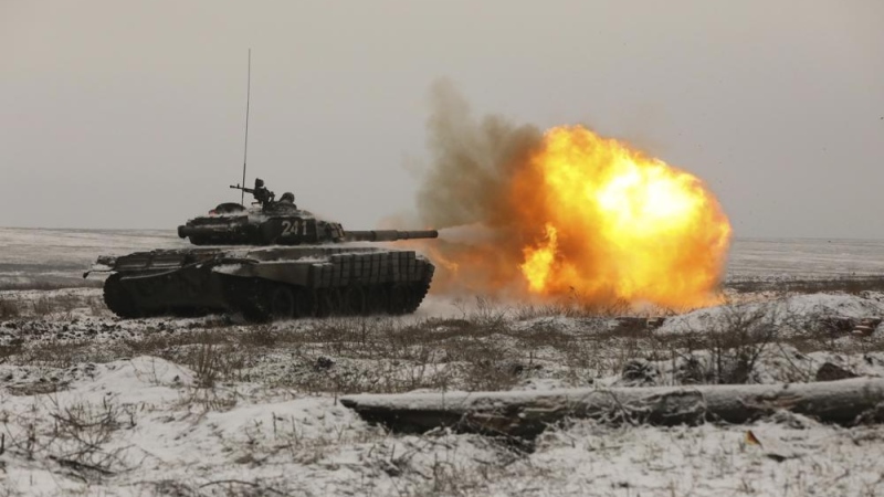 A Russian tank T-72B3 fires as troops take part in drills at the Kadamovskiy firing range in the Rostov region in southern Russia, on Jan. 12, 2022. (AP Photo)