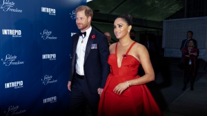 Prince Harry and Meghan Markle, Duke and Duchess of Sussex, arrive at the Intrepid Sea, Air & Space Museum for the Salute to Freedom Gala on Nov. 10, 2021, in New York. (AP Photo/Craig Ruttle) 