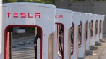 A Tesla Supercharger station in Buford, Ga, on April 22, 2021. (AP Photo/Chris Carlson, File) 
