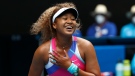 Naomi Osaka of Japan reacts during her first round match against Camila Osorio of Colombia at the Australian Open tennis championships in Melbourne, Australia, Monday, Jan. 17, 2022. (AP Photo/Hamish Blair)