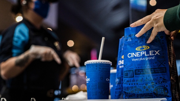 Customers buy popcorn at a Cineplex theatre in downtown Toronto on Wednesday, Aug. 26, 2020. THE CANADIAN PRESS/Christopher Katsarov 