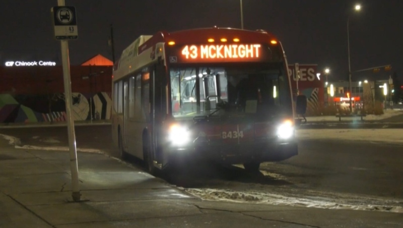 A Calgary Transit bus sits at a stop near Chinook Centre. 