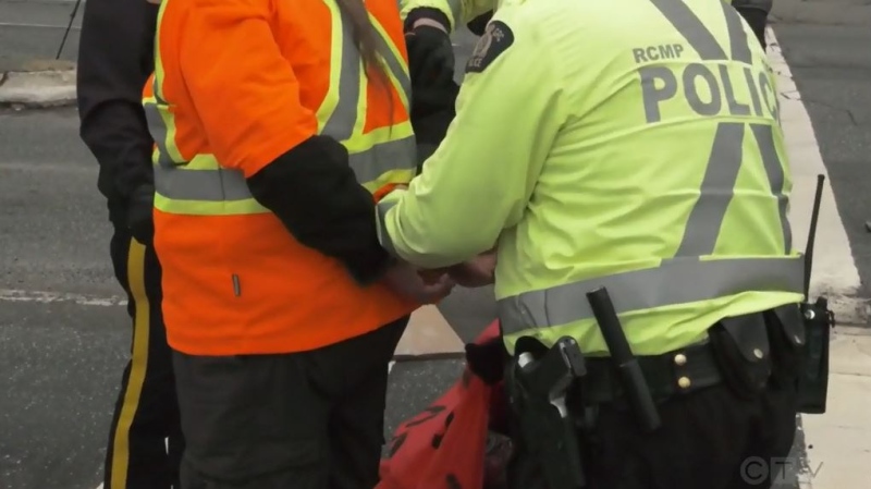 Three activists were arrested minutes after stopping southbound traffic along Terminal Avenue in Nanaimo, B.C., on Jan. 17, 2022. (CTV News)