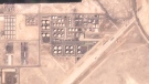 BEFORE: The Abu Dhabi National Oil Co. fuel depot is seen on Jan. 15, 2022, before being targeted in an attack days later. (Planet Labs PBC via AP)