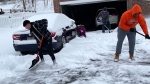 A Penn. high school football coach decided his players would skip a workout and help shovel snow for their neighbours instead.