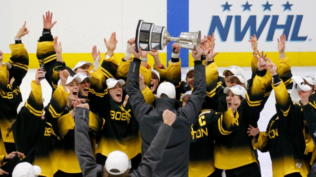 Boston Pride cheer the NWHL Isobel Cup trophy