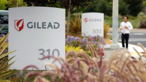  In this July 9, 2015, file photo, a man walks outside the headquarters of Gilead Sciences in Foster City, Calif. Gilead Sciences, Inc. reports quarterly financial results on Wednesday, July 26, 2017. (AP Photo/Eric Risberg, File) 