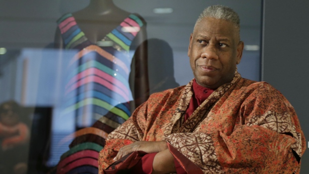 Andre Leon Talley, a former editor at large for Vogue magazine, speaks to a reporter at the opening of the "Black Fashion Designers" exhibit at the Fashion Institute of Technology in New York, Tuesday, Dec. 6, 2016. (AP Photo/Seth Wenig, File) 