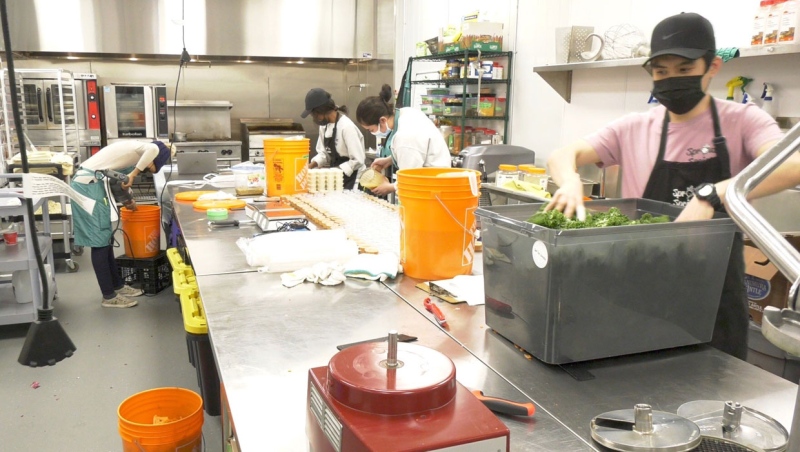 Some of the chefs working on vegetarian dishes in Culinary Coworking's expanded facility in southeast Calgary.