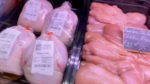 Around the Block Butcher Shop butcher Greg Mountain says you can save money by purchasing a whole chicken instead of a boneless-skinless chicken breast. (Peter Szperling/CTV News Ottawa)