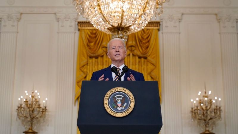 U.S. President Joe Biden speaks during a news conference in the East Room of the White House in Washington, Wednesday, Jan. 19, 2022. (AP Photo/Susan Walsh) 