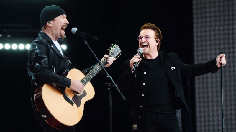 U2's The Edge and Bono perform during Canada 150 celebrations on Parliament Hill in Ottawa on July 1, 2017. (Sean Kilpatrick / THE CANADIAN PRESS)