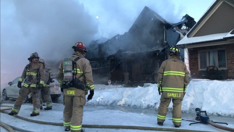 Firefighters battle a blaze on Aridus Crescent in Stittsville on Thursday morning. (Jim O'Grady/CTV News Ottawa)
