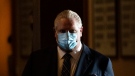 Ontario Premier Doug Ford walks to his press conference at Queen’s Park regarding the easing of restrictions during the COVID-19 pandemic in Toronto on Thursday, January 20, 2022. THE CANADIAN PRESS/Nathan Denette 