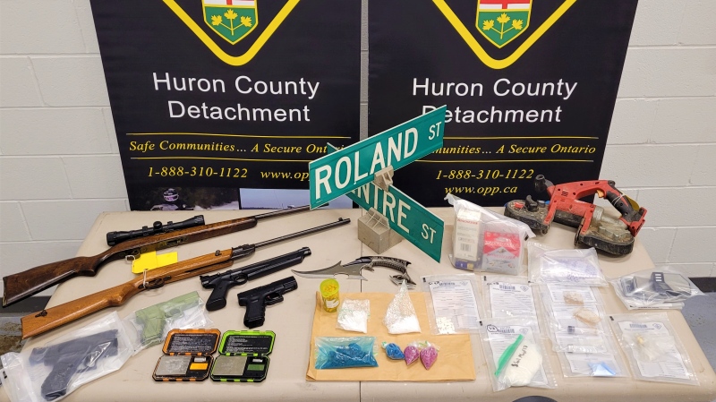 Drugs and firearms seized in Dashwood, Ont. on Tuesday, Jan. 18, 2022 are seen in this image released by Huron County OPP.
