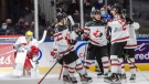 Canada's Cole Perfetti (11), Mason McTavish (23) and Owen Power (25) celebrate a goal against the Czech Republic during second period IIHF World Junior Hockey Championship action in Edmonton on Sunday, December 26, 2021. THE CANADIAN PRESS/Jason Franson