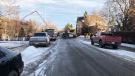 The incident took place on the 100 block of 24th Avenue NW at 3:25 p.m., when Calgary Fire received calls from residents who said they heard two explosions and could see a crane pouring cement hit a power line.