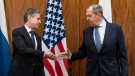 U.S. Secretary of State Antony Blinken, left, greets Russia Foreign Minister Sergey Lavrov before their meeting in Geneva, Switzerland, on Jan. 21, 2022. (AP Photo/Alex Brandon, Pool)