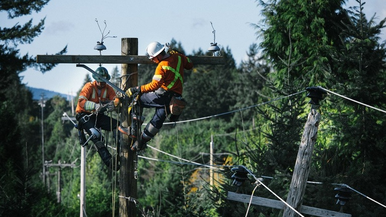 Power line technicians are seen in this undated photo shared by BC Hydro. (BC Hydro/Twitter)