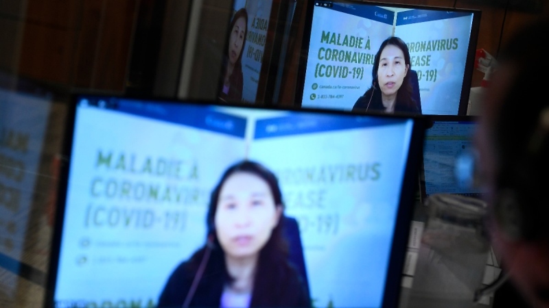 Chief Public Health Officer of Canada Dr. Theresa Tam is seen in an interpreter’s booth during a news conference in Ottawa, on Dec. 17, 2021. (Justin Tang / THE CANADIAN PRESS)