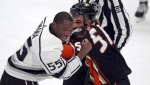 Los Angeles Kings forward Boko Imama, left, and Anaheim Ducks left winger Mike Liambas fight during the first period of an NHL preseason hockey game in Anaheim, Calif., Friday, Sept. 22, 2017. (AP Photo/Reed Saxon) 