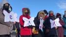 Dozens gathered for a smudge walk to honour lives lost to overdose, addiction and mental illness, in Regina on Jan. 21, 2022. (Stefanie Davis/CTV News)
