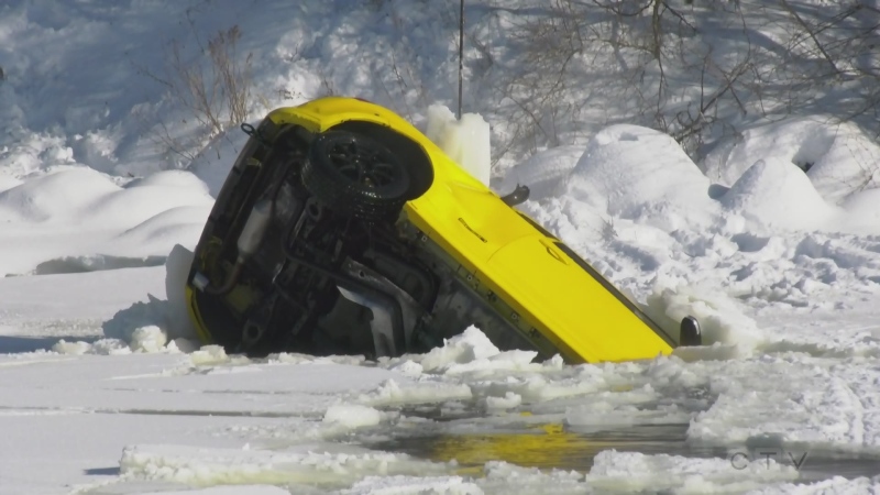 Crews remove vehicle that plunged through ice