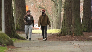 Two students are seen walking at the University of Victoria campus on Friday, Jan. 21, 2022: (CTV News)
