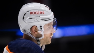 Edmonton Oilers' Leon Draisaitl, of Germany, waits for a faceoff against the Vancouver Canucks during the third period of an NHL hockey game in Vancouver, on Tuesday, May 4, 2021. THE CANADIAN PRESS/Darryl Dyck 
