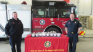 Barrie Fire members stand near a fire truck and carbon monoxide detectors in Barrie, Ont., on Saturday, Jan. 22, 2022 (Steve Mansbridge/CTV News)