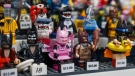 Various Lego mini figures sit for sale, Nov. 29, 2021, inside It's A Block Party in Indianapolis. (Mykal McEldowney / The Indianapolis Star via AP)