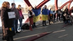 Many of the people who met at the Peace Bridge in Calgary for a rally in support of Ukraine still have family back in the country.