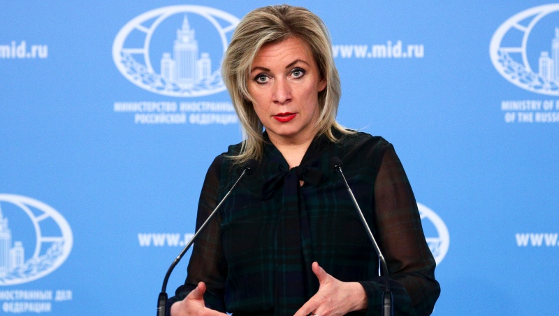 n this photo released by the Russian Foreign Ministry Press Service, Russian Foreign Ministry spokesperson Maria Zakharova gestures while speaking during the briefing about foreign policy in Moscow, Russia, Friday, March 12, 2021. (Russian Foreign Ministry Press Service via AP) 