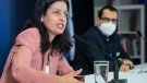 Quebec Liberal Party leader Dominique Anglade, left, speaks during a news conference as Liberal MNA Monsef Derraji looks on in Montreal, Sunday, January 23, 2022. THE CANADIAN PRESS/Graham Hughes