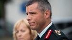 Maj.-Gen. Dany Fortin speaks to reporters outside the Gatineau Police Station after being processed, in Gatineau, Que., on Aug. 18, 2021. THE CANADIAN PRESS/Justin Tang
