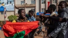 Protestors take to the streets of Burkina Faso's capital Ouagadougou on Jan. 22, 2022, 27, 2021, protesting the government's inability to stop jihadist attacks spreading across the country and calling for President Roch Marc Christian Kabore to resign. (AP Photo/Sophie Garcia)