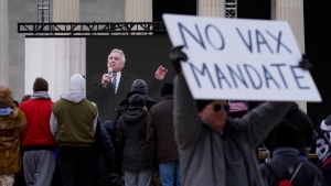 Robert F. Kennedy Jr., is broadcast on a large screen as he speaks during an anti-vaccine rally in front of the Lincoln Memorial in Washington, Sunday, Jan. 23, 2022. (AP Photo/Patrick Semansky) 
