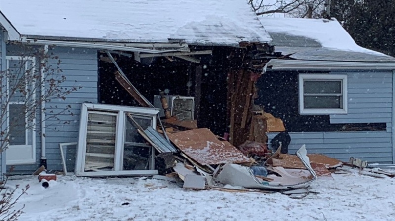 Extensive damage was reported after a vehicle crashed into a home in Lakeshore, Ont., on Monday, Jan. 24, 2022. (Bob Bellacicco / CTV Windsor)