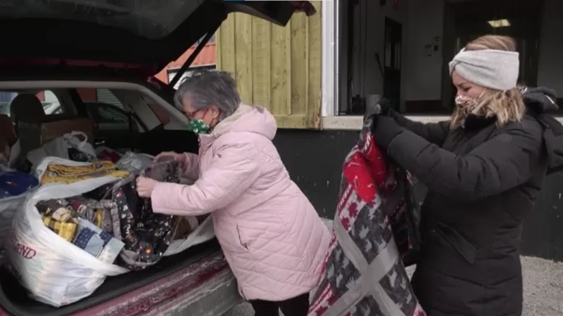 Quilts are dropped off at Project Hope in London, Ont. on Sunday, Jan. 24, 2022. (Jennifer Basa / CTV News)