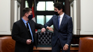 Prime Minister Justin Trudeau meets with Premier of Nunavut P.J. Akeeagok in his West Block office on Parliament Hill in Ottawa, on Dec. 14, 2021. (Justin Tang / THE CANADIAN PRESS)