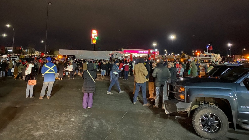 An estimated crowd of more than 1,000 people gathered near the Flying J truck stop in southeast Calgary Monday morning to show support for Freedom Convoy 2022,