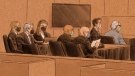 In this courtroom sketch, three former Minneapolis officers charged in the death of George Floyd appear in federal court on Tuesday, Jan. 11, 2022, in St. Paul, Minn. (Cedric Hohnstadt via AP)