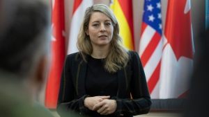 In this photo provided by Ukrainian National Guard Press Office Canada's Minister of Foreign Affairs Melanie Joly speaks during her visit to the National Guard base close to Kyiv, Ukraine, Tuesday, Jan. 18, 2022. (Ukrainian National Guard Press Office via AP) 