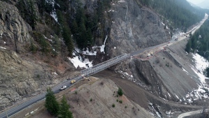 Highway 1 through the Fraser Canyon reopened to all vehicle traffic Monday afternoon, but drivers are being told to expect delays of up to two hours or more (Province of British Columbia/Flickr). 