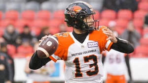BC Lions quarterback Michael Reilly (13) looks for an open receiver against theToronto Argonauts during first half CFL action in Toronto on Saturday, Oct. 30, 2021. THE CANADIAN PRESS/Evan Buhler